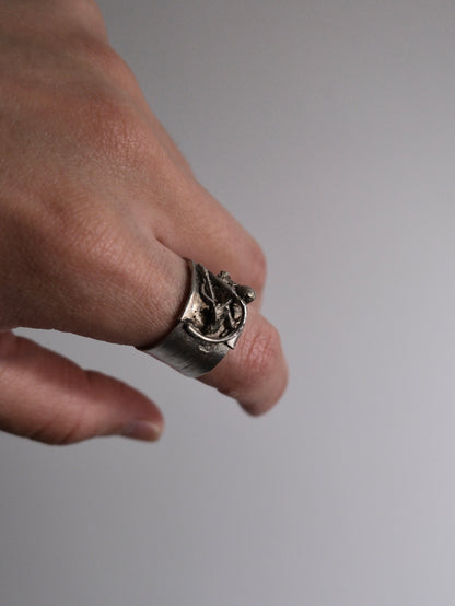 Lotus sterling silver ring worn on the hand